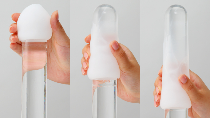 Image of TENGA EGG stretching over acrylic rod
